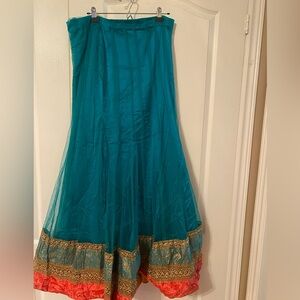 Beautiful teal and pink Indian wedding dress. Includes a long
